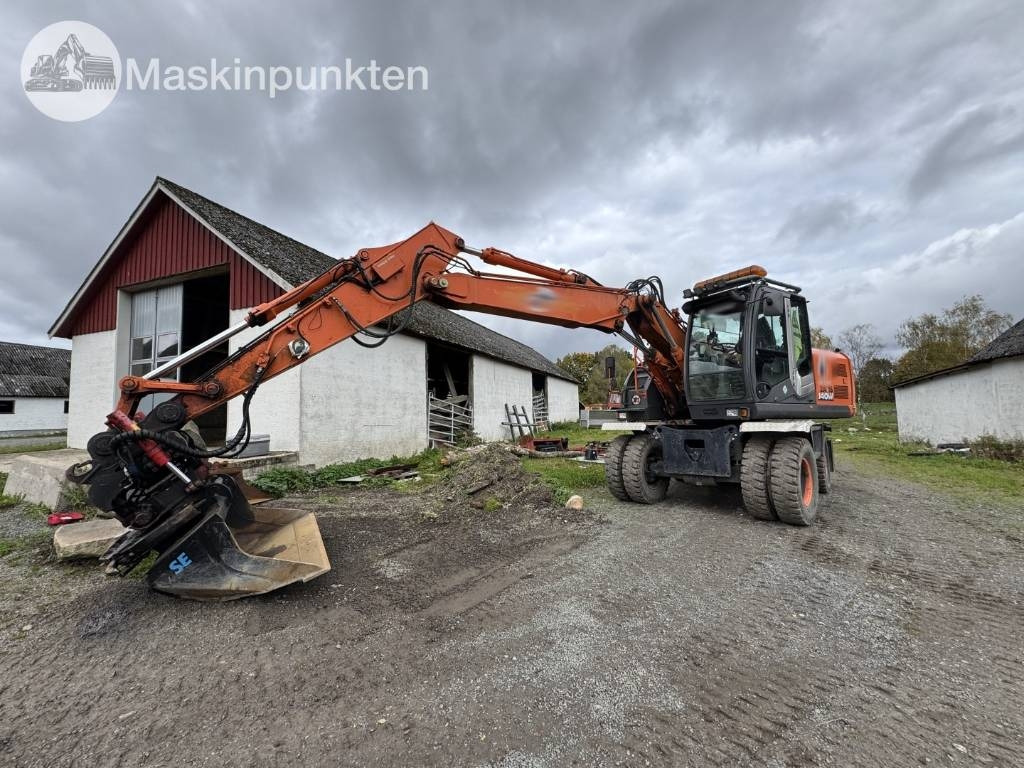 Hitachi ZX 140 W-3 - Колесен багер: снимка 1 Hitachi ZX 140 W-3 - Колесен багер: снимка 1
