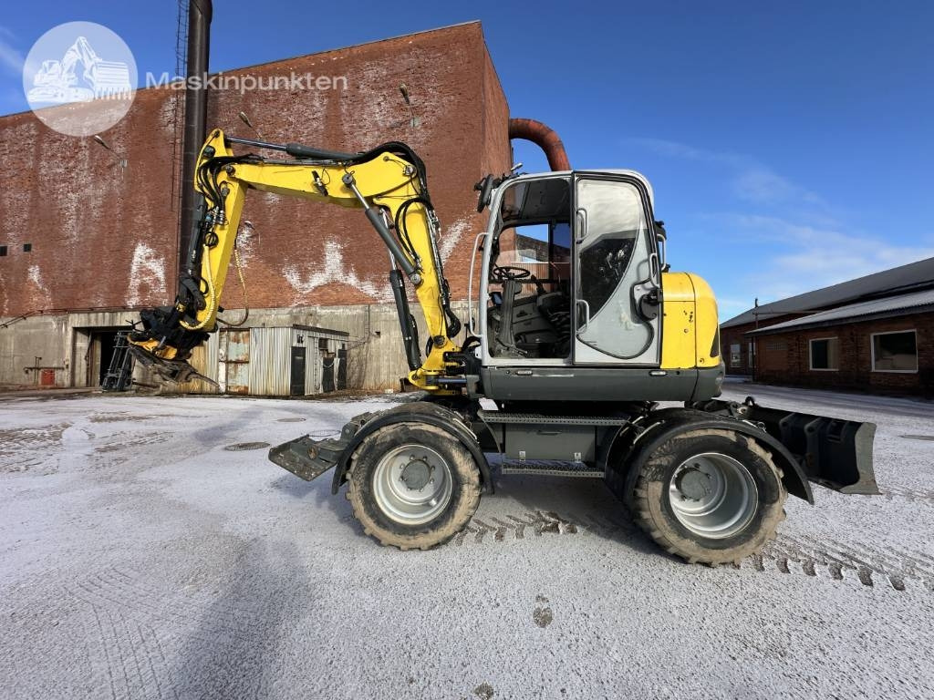 Wacker Neuson EW 100 - Колесен багер: снимка 1 Wacker Neuson EW 100 - Колесен багер: снимка 1