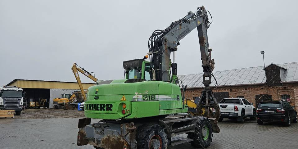 Koparka kołowa Liebherr A 316 Litronic chwytak podpory pług - Колесен багер: снимка 5 Koparka kołowa Liebherr A 316 Litronic chwytak podpory pług - Колесен багер: снимка 5