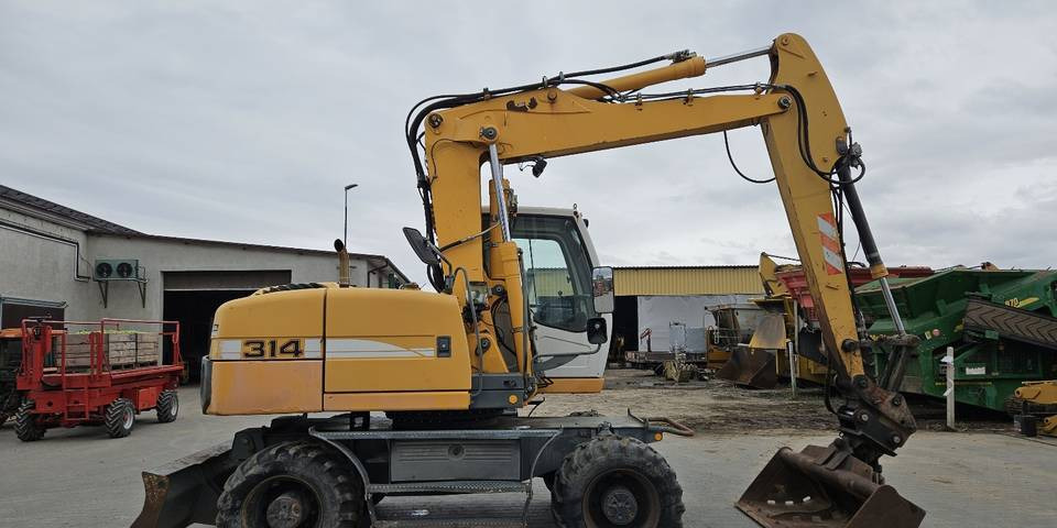 Koparka kołowa Liebherr A314 Litronic 9350 h+ 5 łyżek kołówka - Колесен багер: снимка 5 Koparka kołowa Liebherr A314 Litronic 9350 h+ 5 łyżek kołówka - Колесен багер: снимка 5