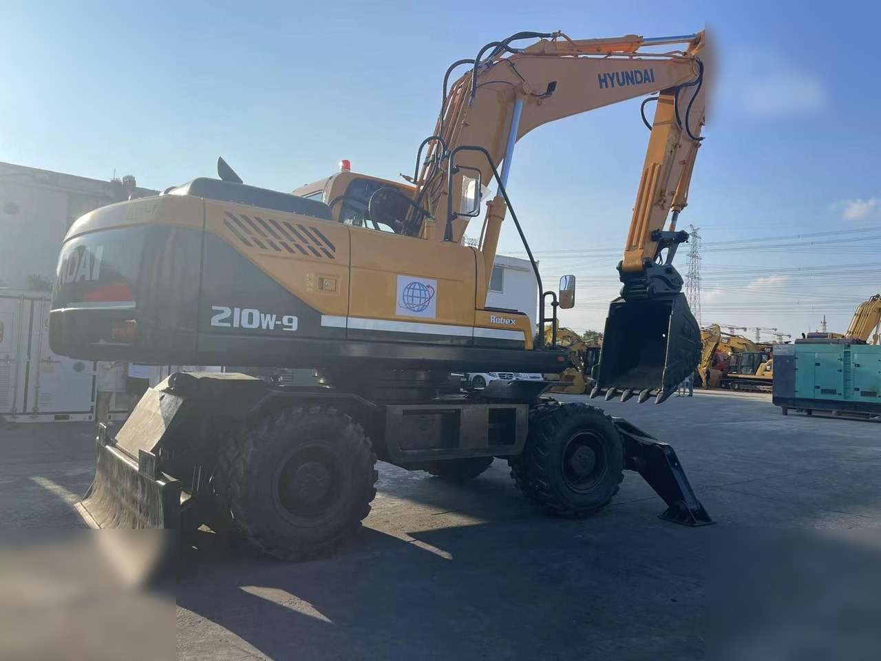HYUNDAI ROBEX 210W-9 - Колесен багер: снимка 2 HYUNDAI ROBEX 210W-9 - Колесен багер: снимка 2