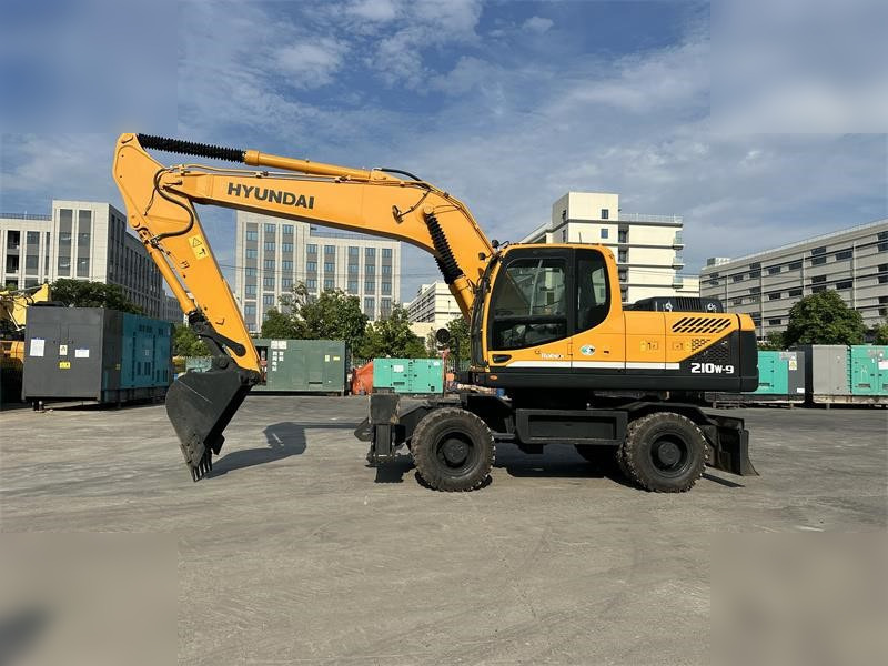 HYUNDAI ROBEX 210W-9 - Колесен багер: снимка 1 HYUNDAI ROBEX 210W-9 - Колесен багер: снимка 1