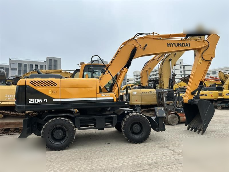 HYUNDAI ROBEX 210W-9 - Колесен багер: снимка 1 HYUNDAI ROBEX 210W-9 - Колесен багер: снимка 1