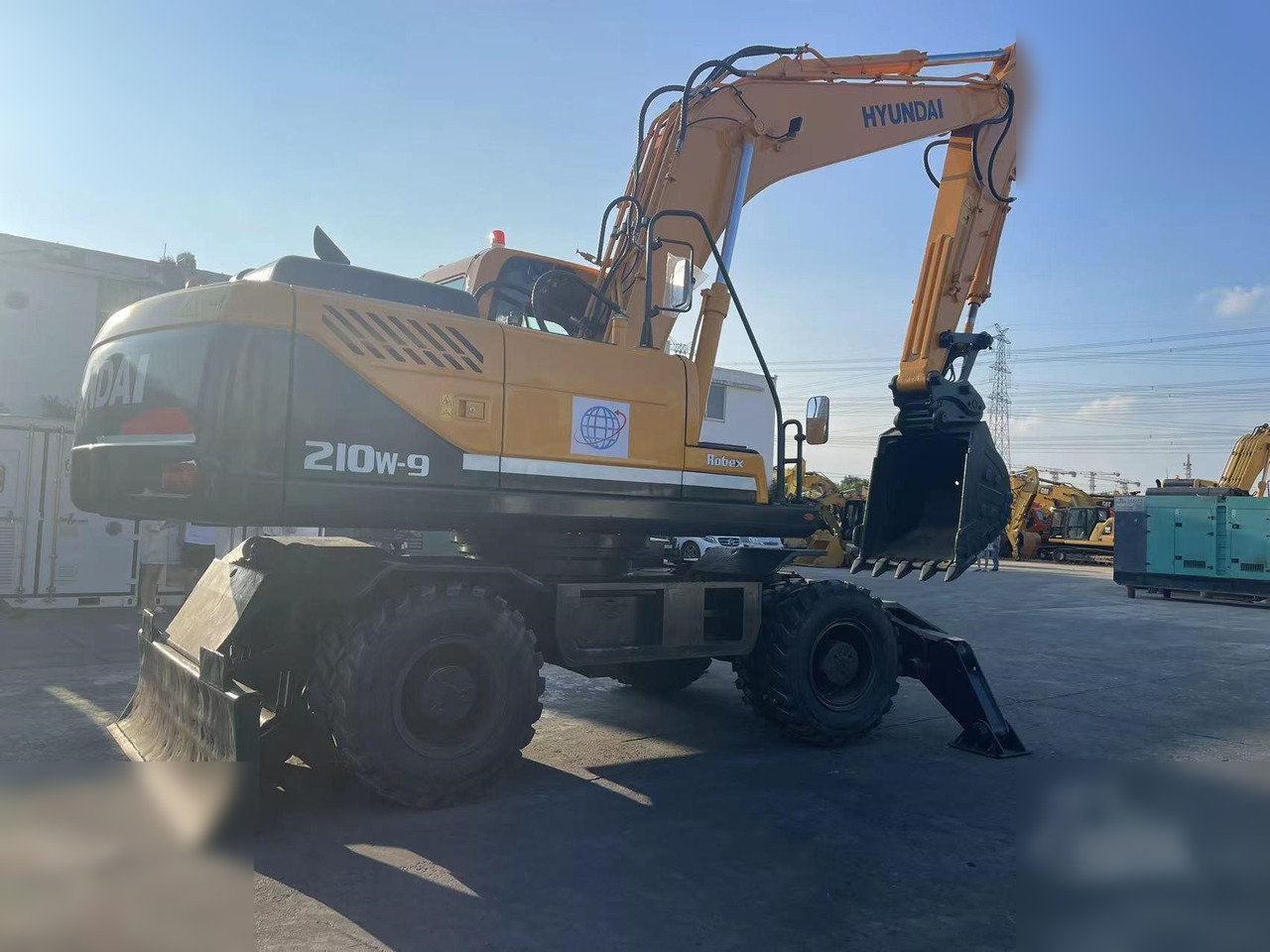 HYUNDAI ROBEX 210W-9 - Колесен багер: снимка 2 HYUNDAI ROBEX 210W-9 - Колесен багер: снимка 2