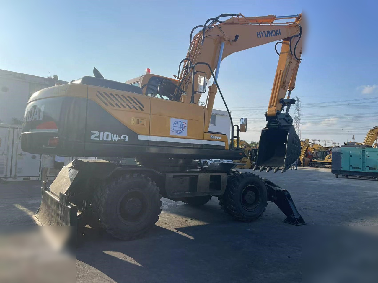 HYUNDAI ROBEX 210W-9 - Колесен багер: снимка 2 HYUNDAI ROBEX 210W-9 - Колесен багер: снимка 2