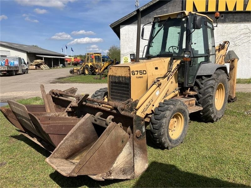 New Holland 675D - Багер-товарач: снимка 1 New Holland 675D - Багер-товарач: снимка 1