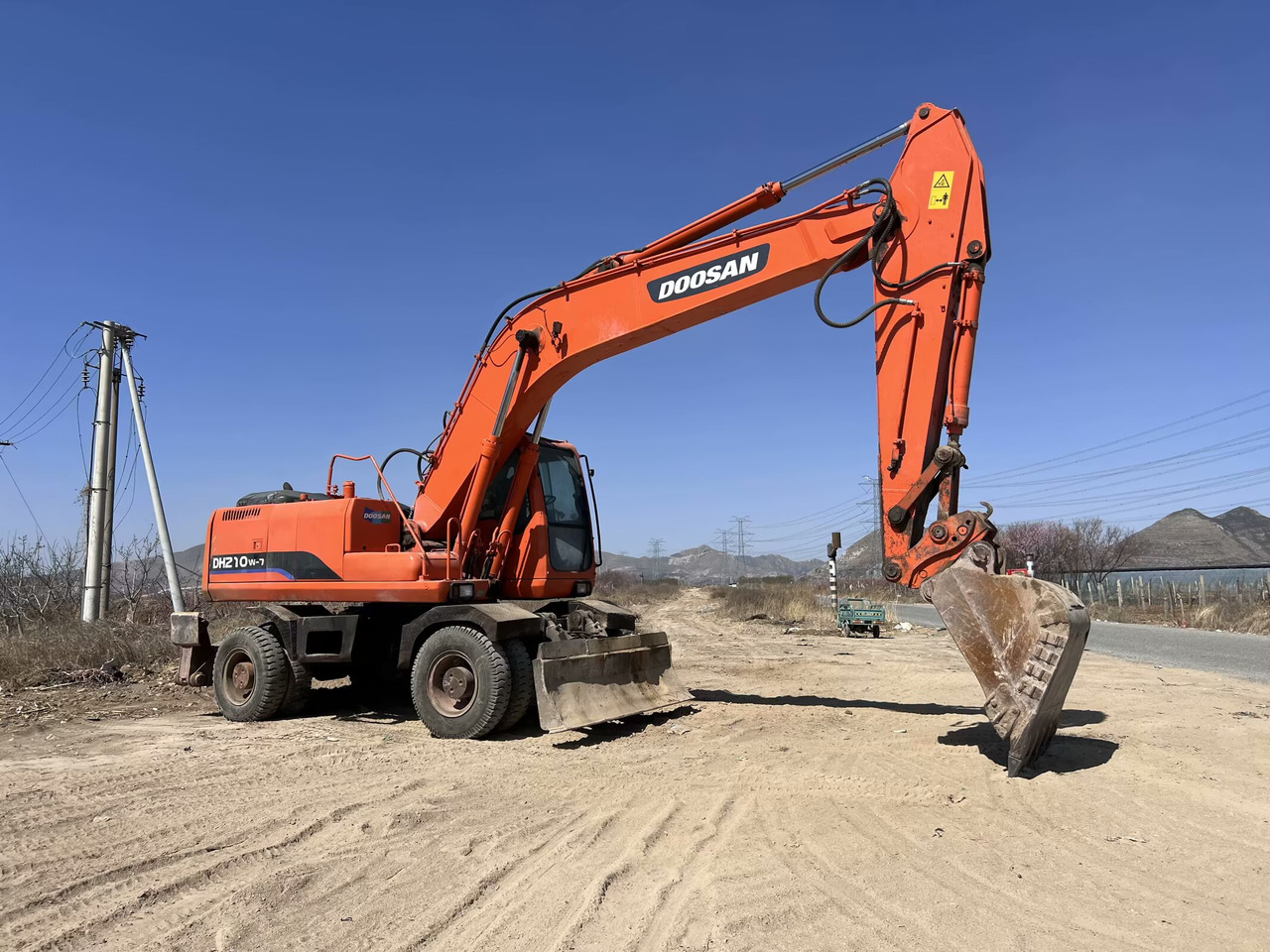 DOOSAN 210w-7 - Колесен багер: снимка 2 DOOSAN 210w-7 - Колесен багер: снимка 2