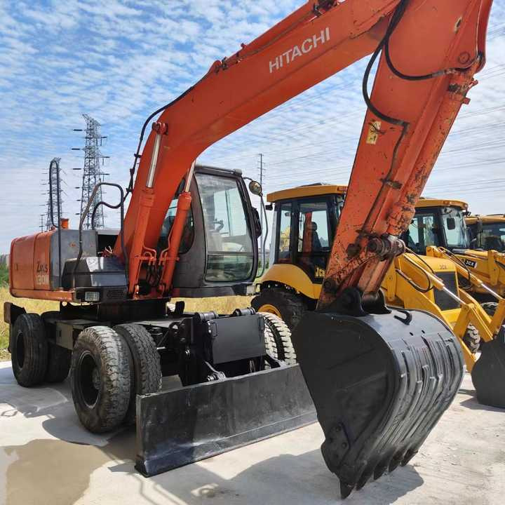 Used Japan Original Brand Hitachi Zx 130w Wheel Excavator Hitachi Zx120 130 200 Excavator for Sale - Багер: снимка 2 Used Japan Original Brand Hitachi Zx 130w Wheel Excavator Hitachi Zx120 130 200 Excavator for Sale - Багер: снимка 2