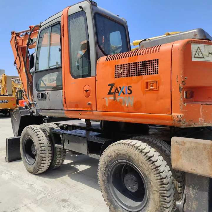 Used Japan Original Brand Hitachi Zx 130w Wheel Excavator Hitachi Zx120 130 200 Excavator for Sale - Багер: снимка 5 Used Japan Original Brand Hitachi Zx 130w Wheel Excavator Hitachi Zx120 130 200 Excavator for Sale - Багер: снимка 5