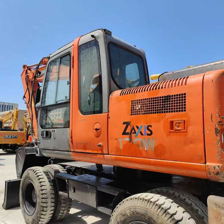 Used Japan Original Brand Hitachi Zx 130w Wheel Excavator Hitachi Zx120 130 200 Excavator for Sale - Багер: снимка 3 Used Japan Original Brand Hitachi Zx 130w Wheel Excavator Hitachi Zx120 130 200 Excavator for Sale - Багер: снимка 3