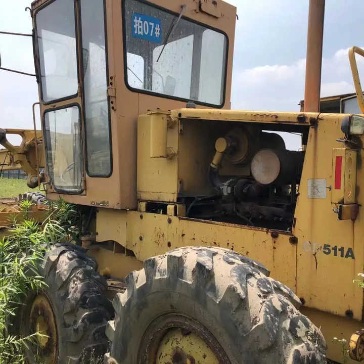 Japan Komatsu GD511 Motor Grader Cheap Price Komatsu Road Grader GD511 Good Condition in China - Грейдер: снимка 1 Japan Komatsu GD511 Motor Grader Cheap Price Komatsu Road Grader GD511 Good Condition in China - Грейдер: снимка 1