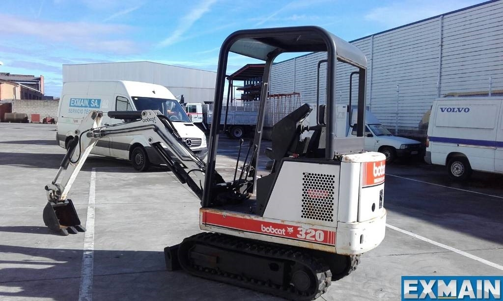 Bobcat X 320 - Мини багер: снимка 3 Bobcat X 320 - Мини багер: снимка 3