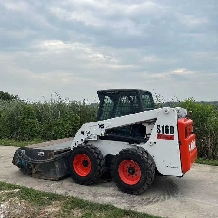 USED BOBCAT S160 Skid-steer Loader Bobcat S160 Carry Sweeper with Very Good Performance Is for Sale at a Low Price. - Мини челен товарач: снимка 1 USED BOBCAT S160 Skid-steer Loader Bobcat S160 Carry Sweeper with Very Good Performance Is for Sale at a Low Price. - Мини челен товарач: снимка 1