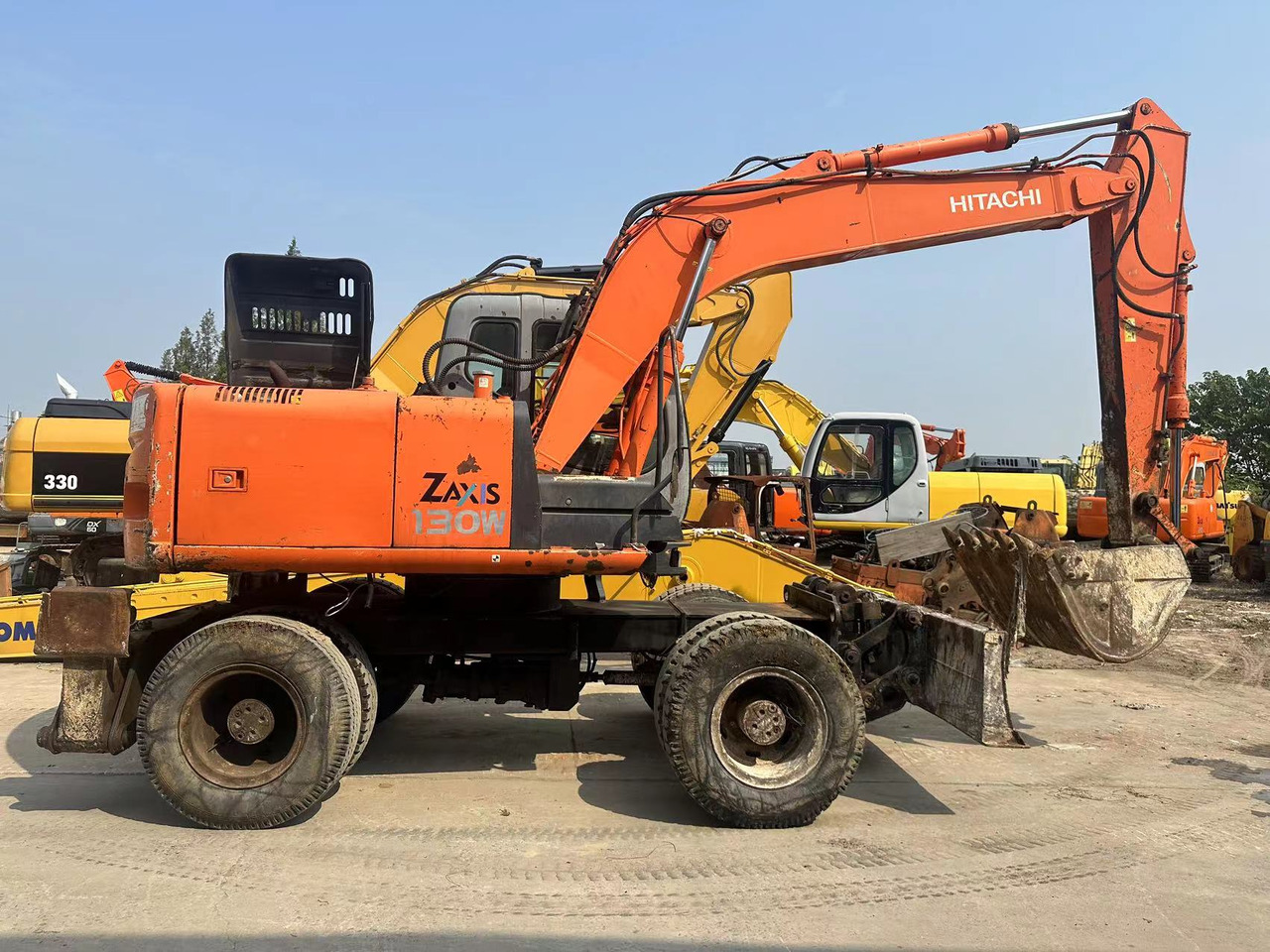HITACHI ZX130 - Колесен багер: снимка 1 HITACHI ZX130 - Колесен багер: снимка 1