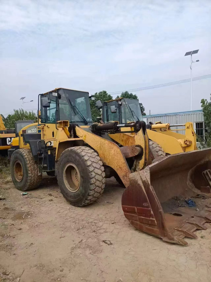 KOMATSU WA320-5 - Колесен товарач: снимка 4 KOMATSU WA320-5 - Колесен товарач: снимка 4