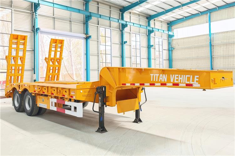TITAN 2 Axle Low Loader Truck Trailer for Sale In Uganda - Нискорамна площадка полуремарке: снимка 1 TITAN 2 Axle Low Loader Truck Trailer for Sale In Uganda - Нискорамна площадка полуремарке: снимка 1