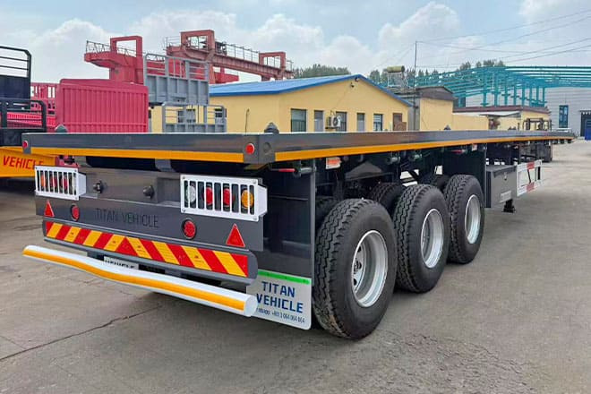 TITAN 3 Axle Flatbed Semi Trailer for Sale in Ghana - Бордово полуремарке/ Платформа: снимка 2 TITAN 3 Axle Flatbed Semi Trailer for Sale in Ghana - Бордово полуремарке/ Платформа: снимка 2
