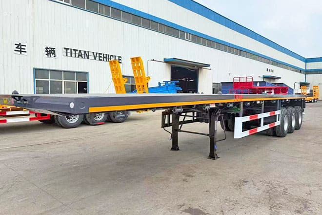 TITAN 3 Axle Flatbed Semi Trailer for Sale in Ghana - Бордово полуремарке/ Платформа: снимка 1 TITAN 3 Axle Flatbed Semi Trailer for Sale in Ghana - Бордово полуремарке/ Платформа: снимка 1
