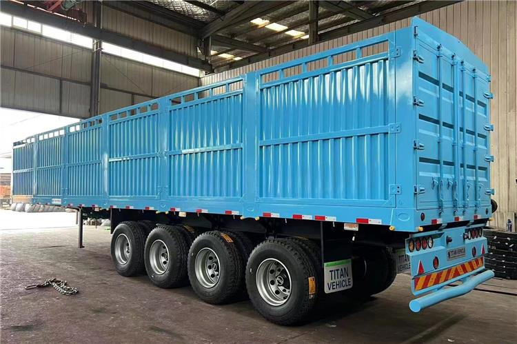 TITAN 4 Axle Fence Semi Truck Trailer for Sale price In Rwanda - За превоз на животни полуремарке: снимка 1 TITAN 4 Axle Fence Semi Truck Trailer for Sale price In Rwanda - За превоз на животни полуремарке: снимка 1