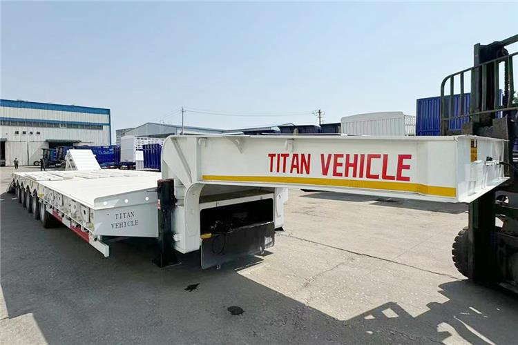 TITAN 5 Axle 100 Ton Low Bed Trailer for Sale In Tanzania - Нискорамна площадка полуремарке: снимка 5 TITAN 5 Axle 100 Ton Low Bed Trailer for Sale In Tanzania - Нискорамна площадка полуремарке: снимка 5