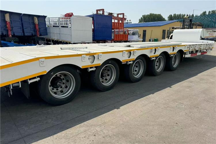 TITAN 5 Axle 100 Ton Low Bed Trailer for Sale In Tanzania - Нискорамна площадка полуремарке: снимка 3 TITAN 5 Axle 100 Ton Low Bed Trailer for Sale In Tanzania - Нискорамна площадка полуремарке: снимка 3