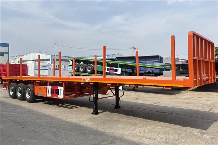 TITAN Container Flatbed Truck Trailer with Piles In Angola - Контейнеровоз/ Сменна каросерия полуремарке: снимка 1 TITAN Container Flatbed Truck Trailer with Piles In Angola - Контейнеровоз/ Сменна каросерия полуремарке: снимка 1