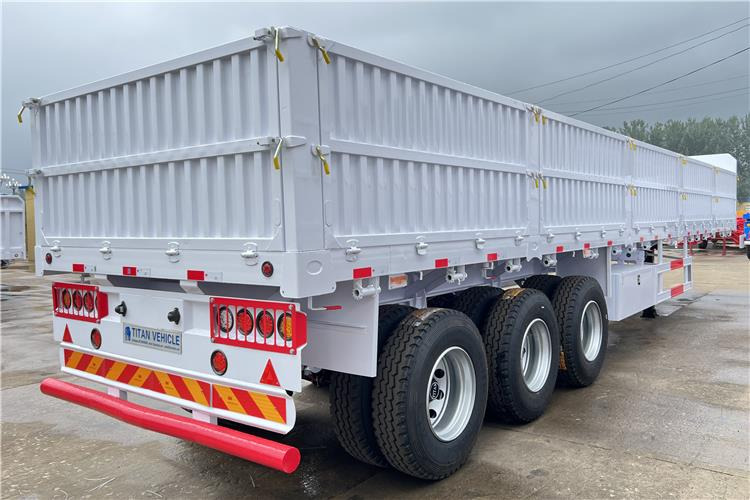 TITAN Tri Axle Dropside Trailer For Sale In Nigeria Lagos - Бордово полуремарке/ Платформа: снимка 2 TITAN Tri Axle Dropside Trailer For Sale In Nigeria Lagos - Бордово полуремарке/ Платформа: снимка 2