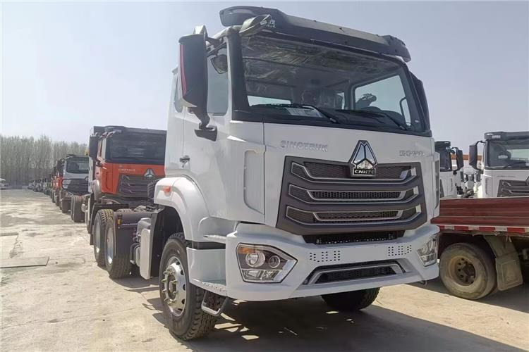 SINOTRUK Hohan NX Truck Price 371 hp 10 Wheeler for Sale In Tanzania - Влекач: снимка 1 SINOTRUK Hohan NX Truck Price 371 hp 10 Wheeler for Sale In Tanzania - Влекач: снимка 1