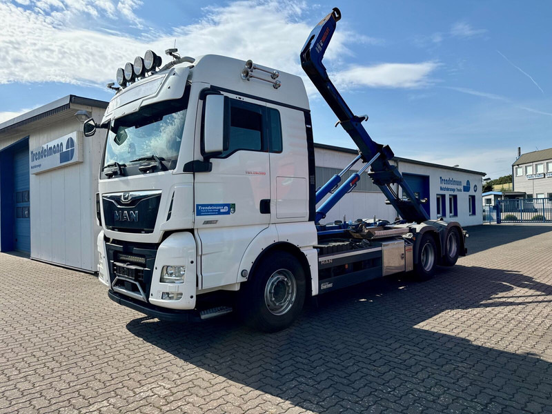 MAN TGX 26.580 BL 6x2 Zwillingbereifte Liftachse Abroller Hiab Funk- - Мултилифт с кука камион: снимка 1 MAN TGX 26.580 BL 6x2 Zwillingbereifte Liftachse Abroller Hiab Funk- - Мултилифт с кука камион: снимка 1