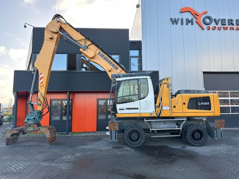 Liebherr LH 30 M - Багер за манипулиране на материали: снимка 1 Liebherr LH 30 M - Багер за манипулиране на материали: снимка 1