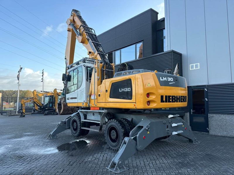 Багер за манипулиране на материали За превоз на боклук Liebherr LH 30 M: снимка 7
