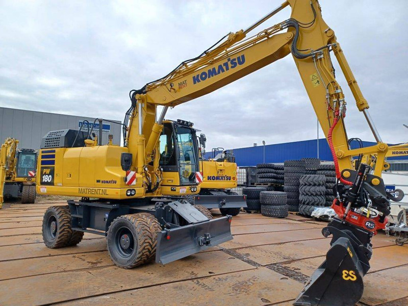 Komatsu PW180-11E0 - Колесен багер: снимка 1 Komatsu PW180-11E0 - Колесен багер: снимка 1
