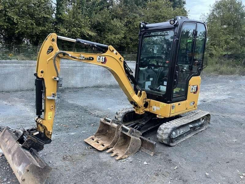 Caterpillar 302 - Мини багер: снимка 1 Caterpillar 302 - Мини багер: снимка 1