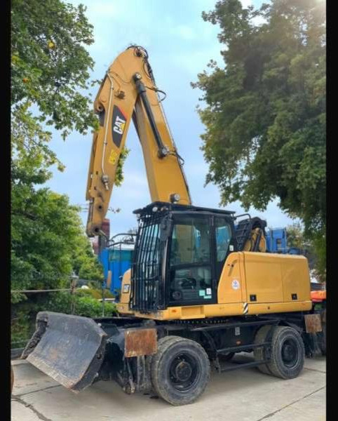 Caterpillar MH3022 - Багер за манипулиране на материали: снимка 1 Caterpillar MH3022 - Багер за манипулиране на материали: снимка 1