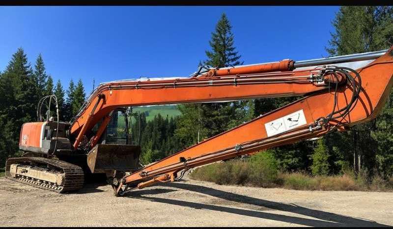Hitachi ZX210LC-3 - Багер за манипулиране на материали: снимка 1 Hitachi ZX210LC-3 - Багер за манипулиране на материали: снимка 1