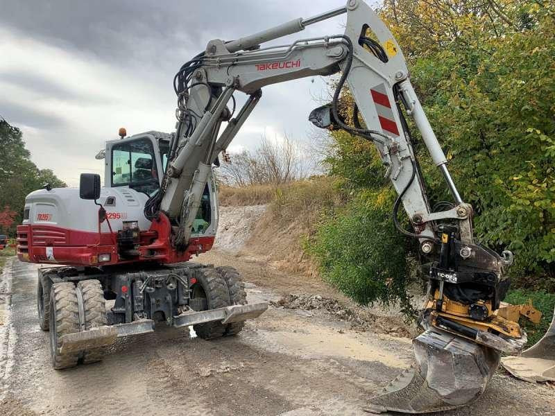 Takeuchi TB295W - Колесен багер: снимка 1 Takeuchi TB295W - Колесен багер: снимка 1