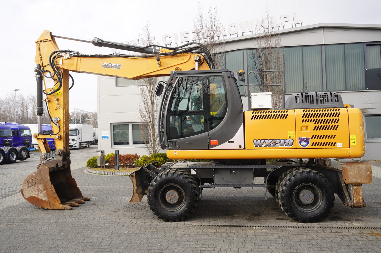 CASE WX218 / 23t wheeled excavator / 3 times folding arm - Колесен багер: снимка 1 CASE WX218 / 23t wheeled excavator / 3 times folding arm - Колесен багер: снимка 1