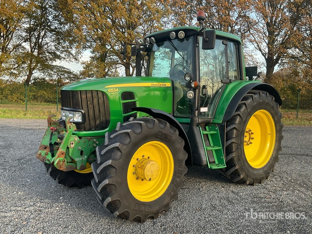 2010 John Deere 6534 Premium 4WD Tractor - Трактор: снимка 1 2010 John Deere 6534 Premium 4WD Tractor - Трактор: снимка 1
