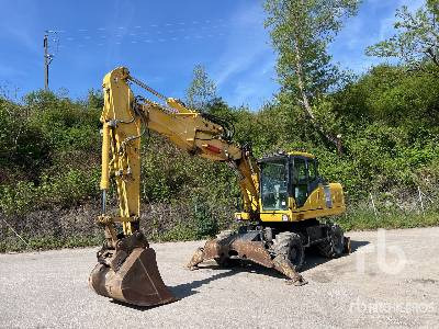 KOMATSU PW180-7E0 Pelle Sur Pneus - Колесен багер: снимка 1 KOMATSU PW180-7E0 Pelle Sur Pneus - Колесен багер: снимка 1