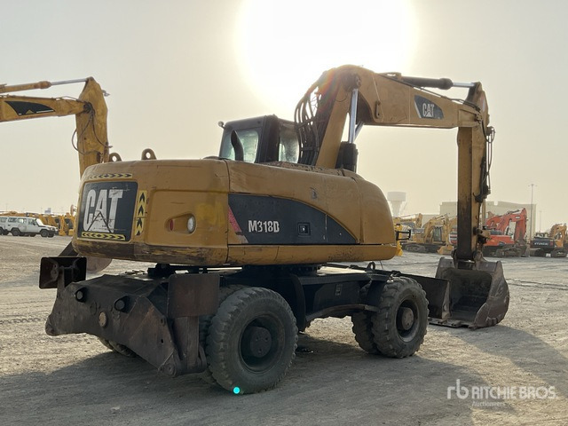 2012 Cat M318D - Колесен багер: снимка 3 2012 Cat M318D - Колесен багер: снимка 3