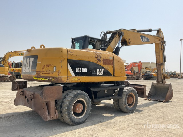 2012 Cat M318D - Колесен багер: снимка 3 2012 Cat M318D - Колесен багер: снимка 3