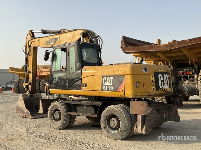 2012 Cat M318D - Колесен багер: снимка 4 2012 Cat M318D - Колесен багер: снимка 4