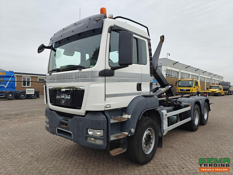 MAN TGS-TGX 26.440 6x4 Dagcabine Euro5 - AJK 20T HaakarmSysteem - Volledig Bladgeveerd - Naafreductie - Handgeschakeld - Мултилифт с кука камион: снимка 1 MAN TGS-TGX 26.440 6x4 Dagcabine Euro5 - AJK 20T HaakarmSysteem - Volledig Bladgeveerd - Naafreductie - Handgeschakeld - Мултилифт с кука камион: снимка 1