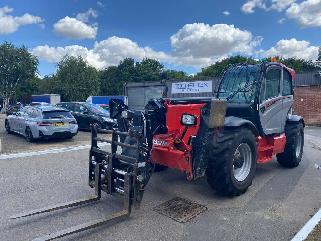Телескопичен товарач Manitou MT 1440: снимка 9