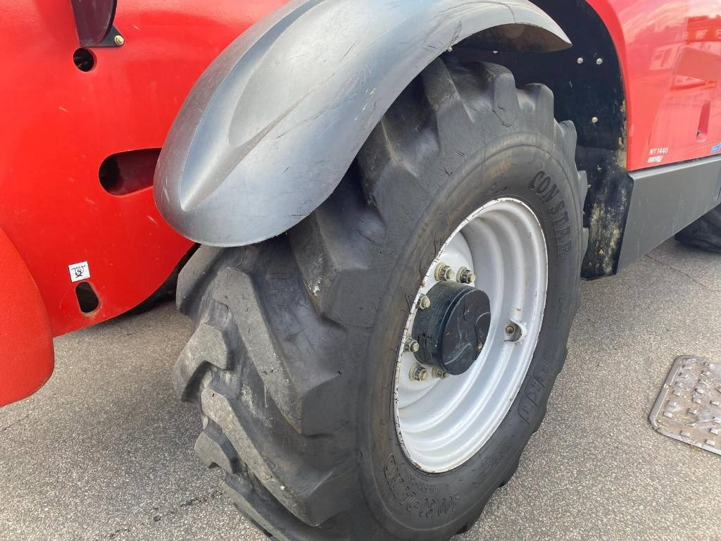 Телескопичен товарач Manitou MT 1440: снимка 17