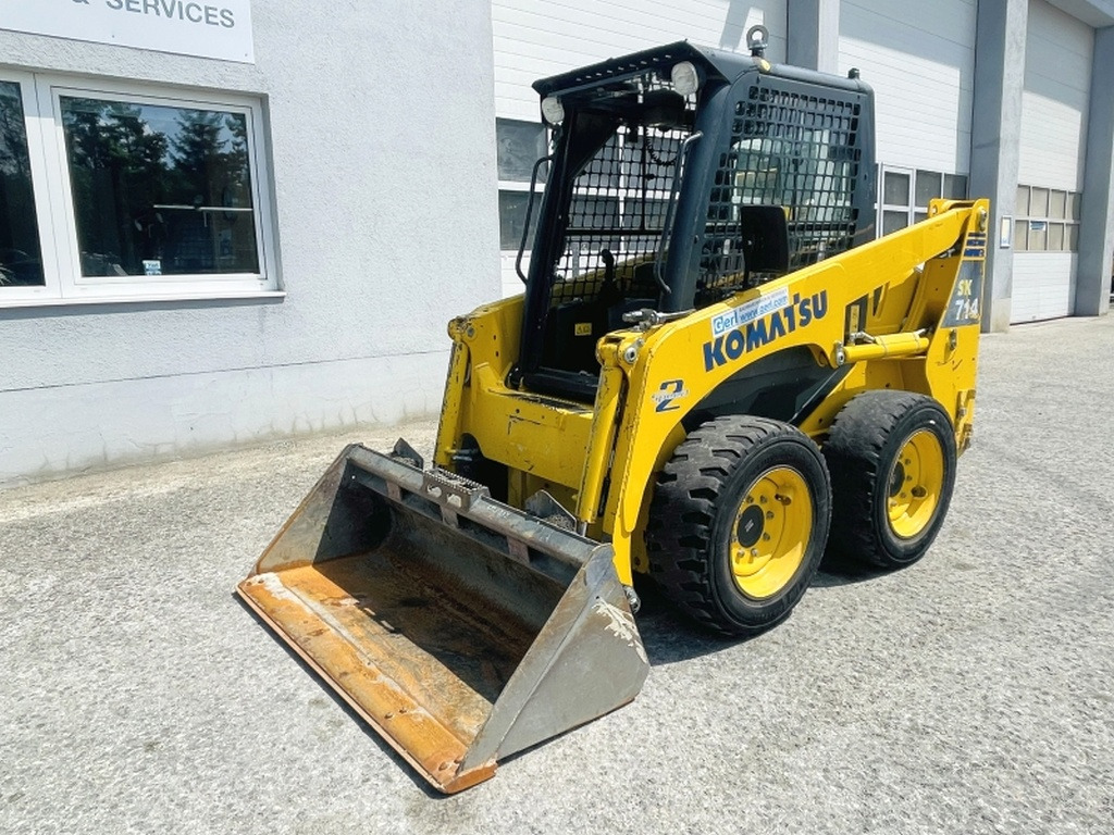 Komatsu SK714 (4012) - Мини челен товарач: снимка 4 Komatsu SK714 (4012) - Мини челен товарач: снимка 4