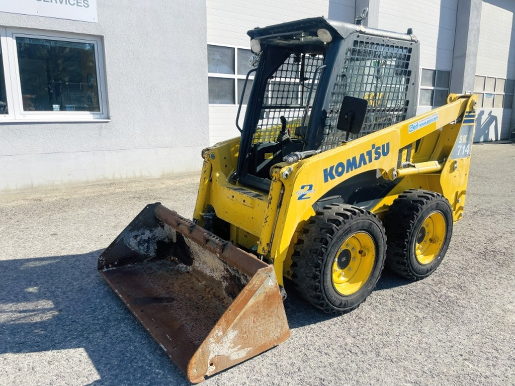 Komatsu SK714 (4077) - Мини челен товарач: снимка 4 Komatsu SK714 (4077) - Мини челен товарач: снимка 4