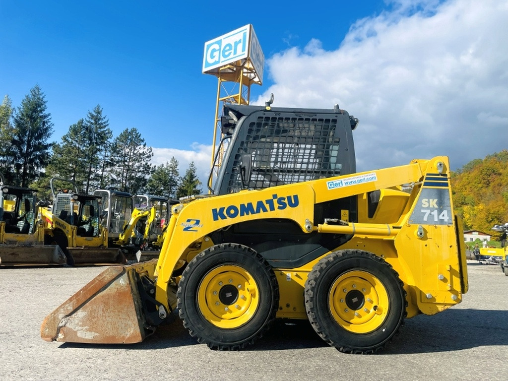 Komatsu SK714 (4077) - Мини челен товарач: снимка 1 Komatsu SK714 (4077) - Мини челен товарач: снимка 1