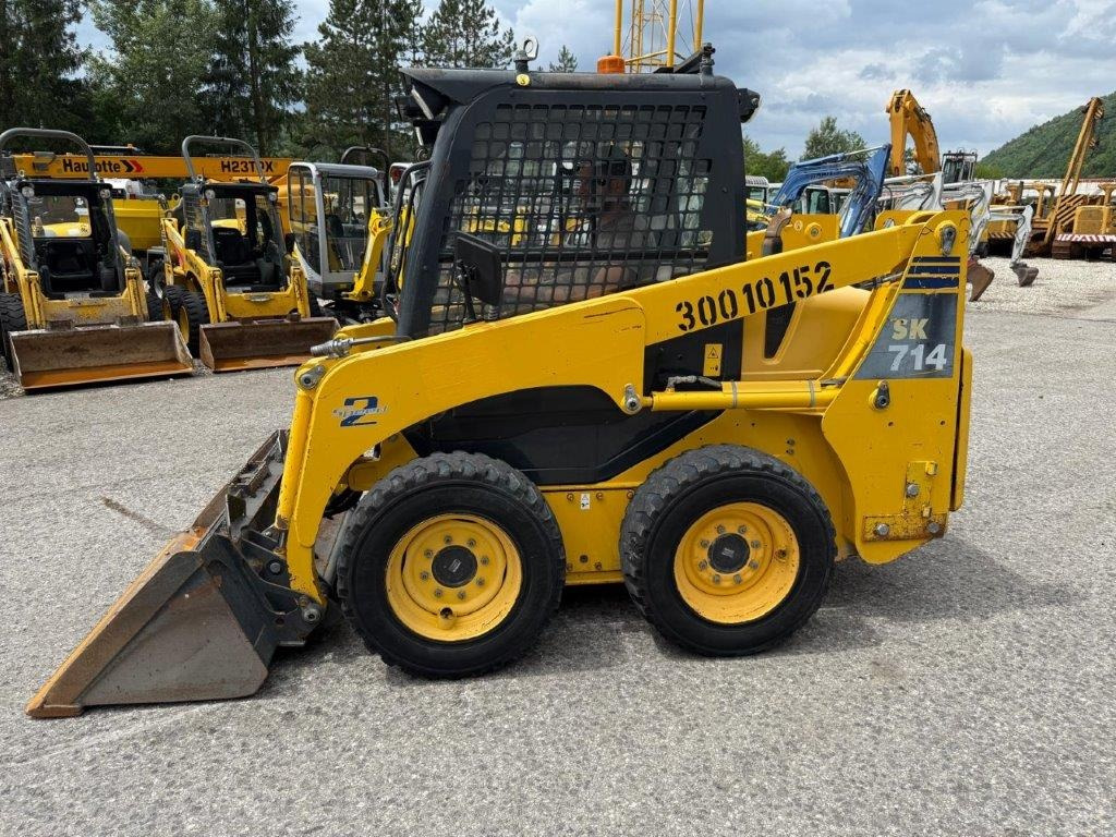 Komatsu SK714-5 (4026) - Мини челен товарач: снимка 1 Komatsu SK714-5 (4026) - Мини челен товарач: снимка 1