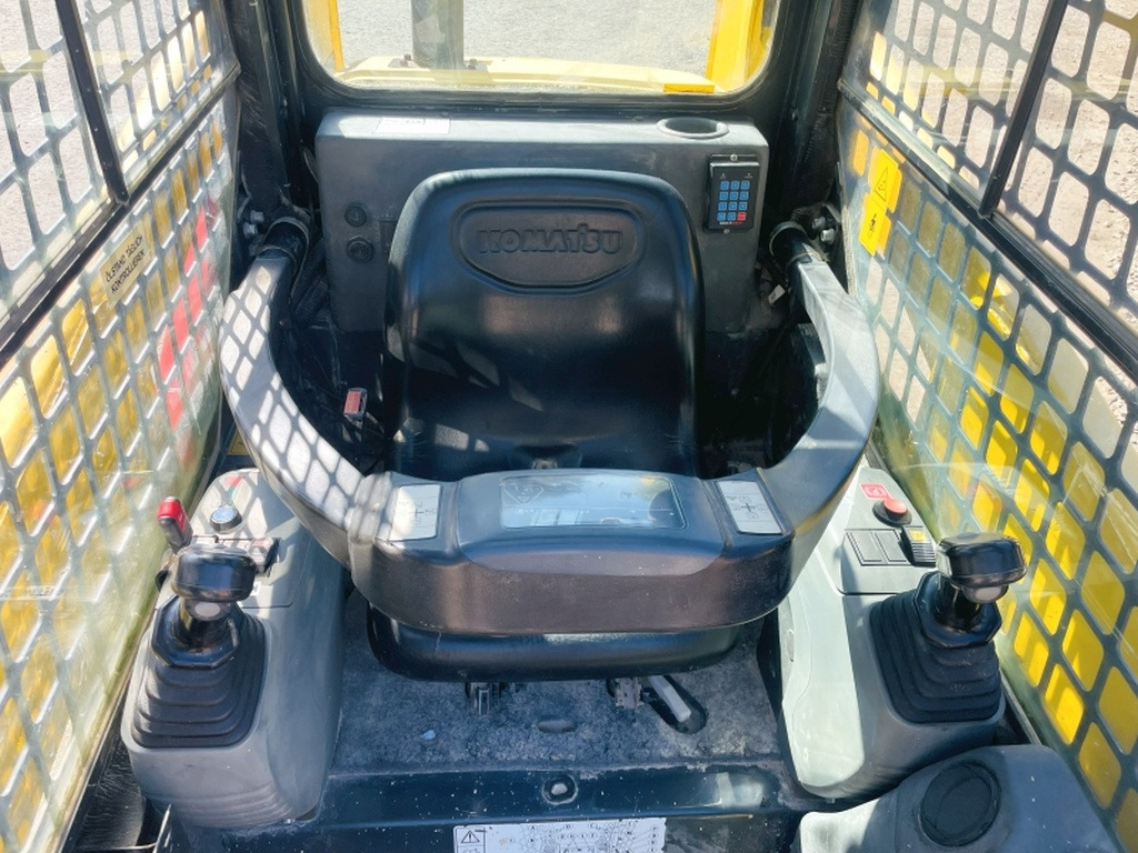 Komatsu SK714-5 (4065) - Мини челен товарач: снимка 5 Komatsu SK714-5 (4065) - Мини челен товарач: снимка 5